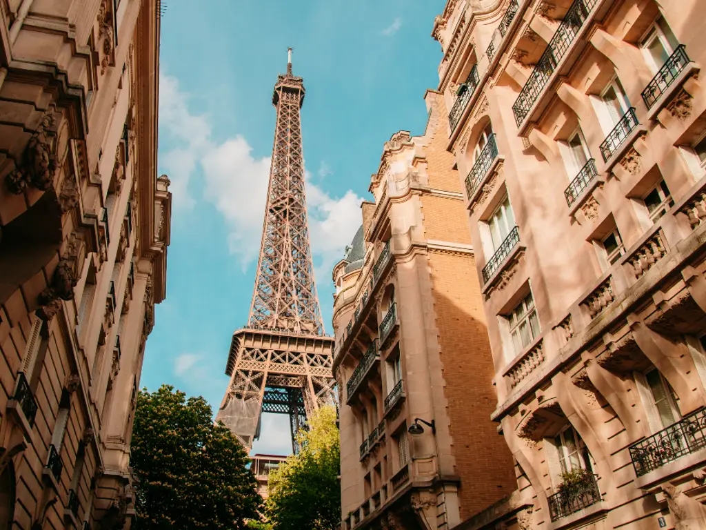 The Eiffel Tower through an alleyway in Paris